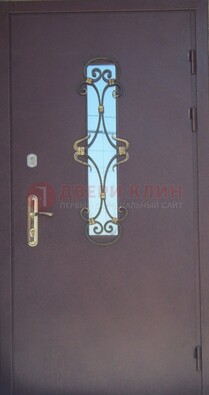 Металлическая дверь со стеклом и ковкой ДСК-77 в Волжском