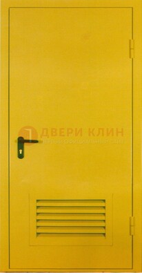 Желтая металлическая противопожарная дверь с вентиляционной решеткой ДТ-15 в Волжском